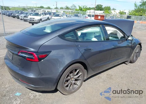 2021 Tesla Model 3 Standard Range Plus Rear-Wheel Drive from USA, damaged, VIN 5YJ3E1EA5MF920820